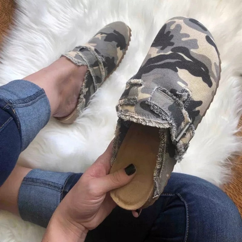 women's faux suede wedge slippers in camouflage pattern, showcasing stylish comfort and a casual look.